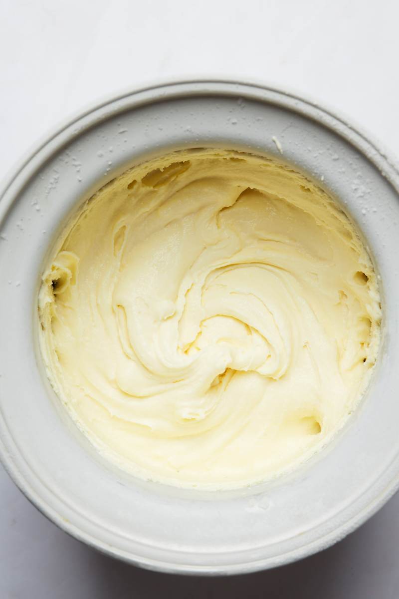 Freshly churned ice cream in a metal canister